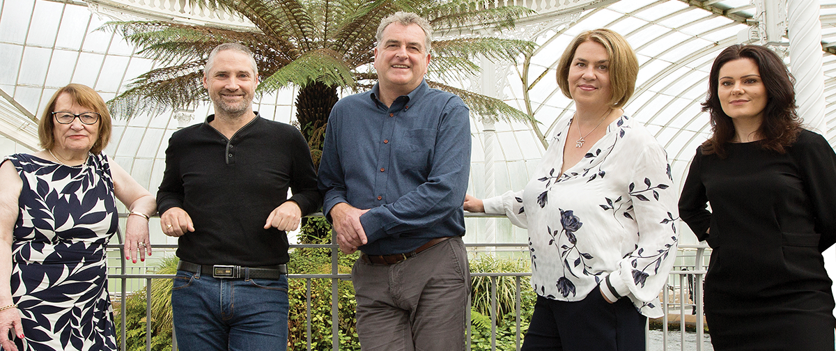 Gropu shot of Core Associates team outside their Glasgow office